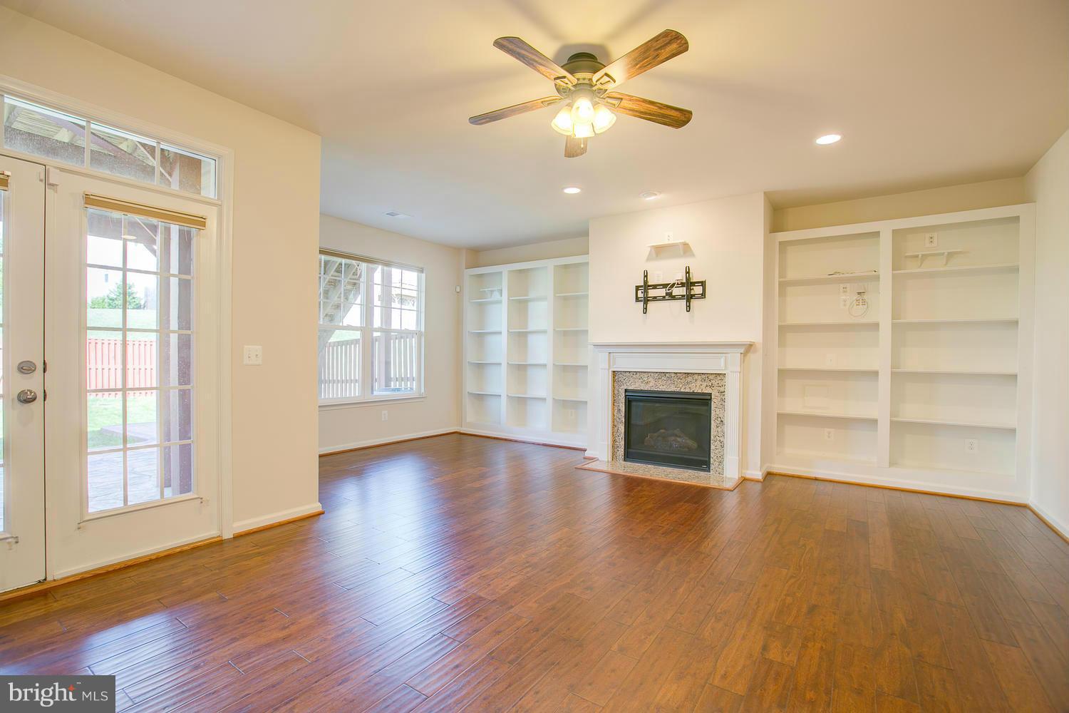 141 Short Branch Road Stafford, VA 22556 - Photo 21 of 30 a view of an empty room with a window and fireplace
