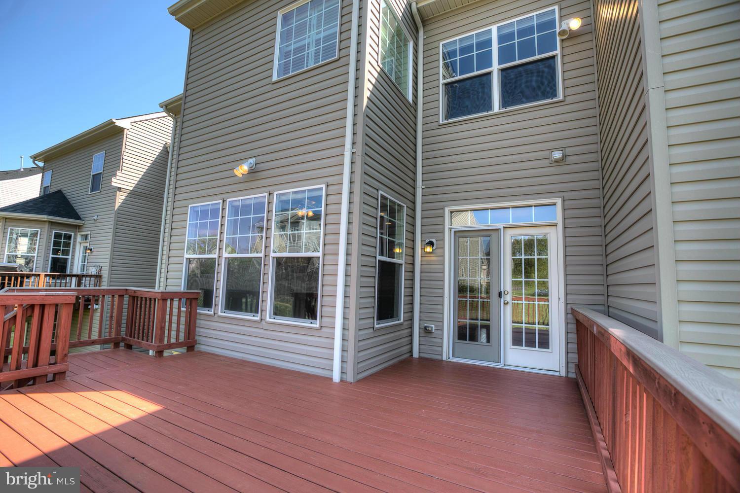 141 Short Branch Road Stafford, VA 22556 - Photo 23 of 30 a view of a house with porch and wooden floor