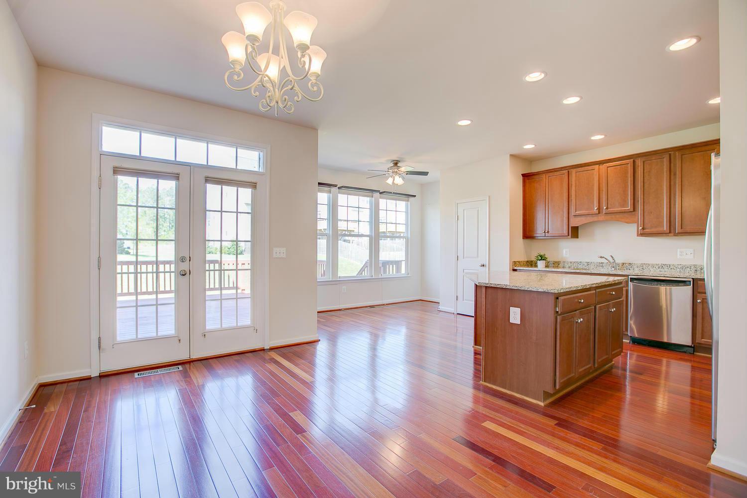 141 Short Branch Road Stafford, VA 22556 - Photo 8 of 30 a spacious bathroom with stainless steel appliances granite countertop wooden floors and a large window