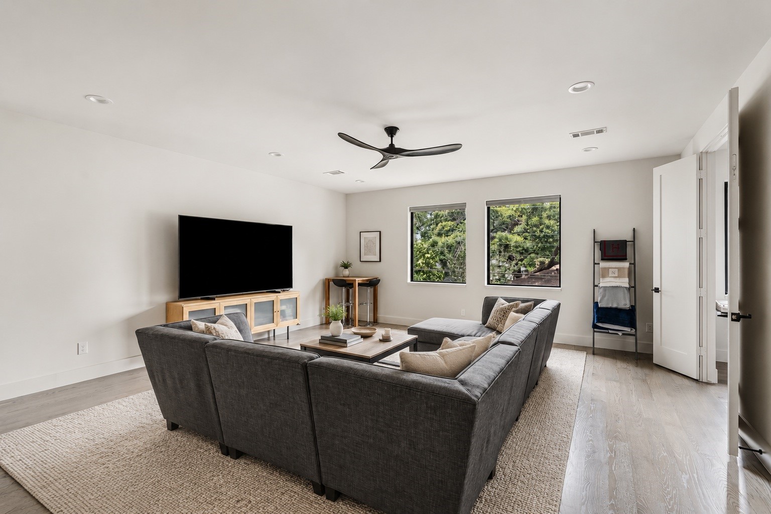 4638 Merwin Street Houston, TX 77027 - Photo 24 of 42 Perfect for movie nights, game days, or everyday relaxation, the game room provides an inviting gathering space.