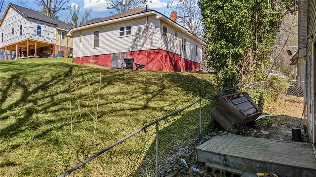 5 Ivy Street Canton, GA 30114 - Photo 8 of 27 a view of a house with backyard
