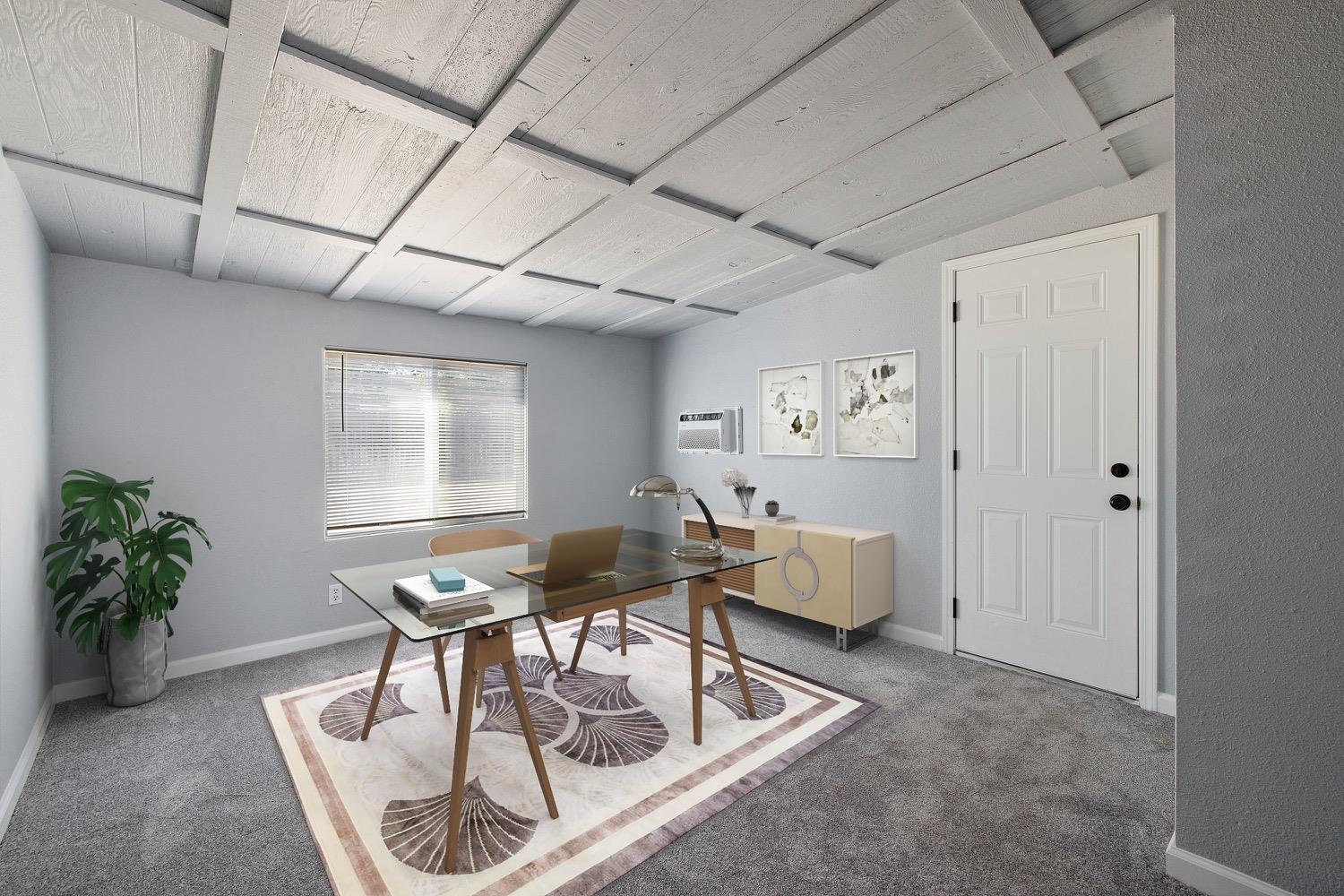 71 East Griffith Way Fresno, CA 93704 - Photo 17 of 35 a workspace with furniture and white walls