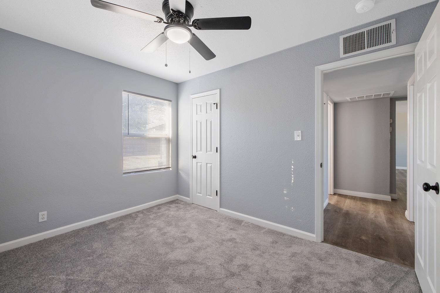 71 East Griffith Way Fresno, CA 93704 - Photo 21 of 35 a view of an empty room with a window