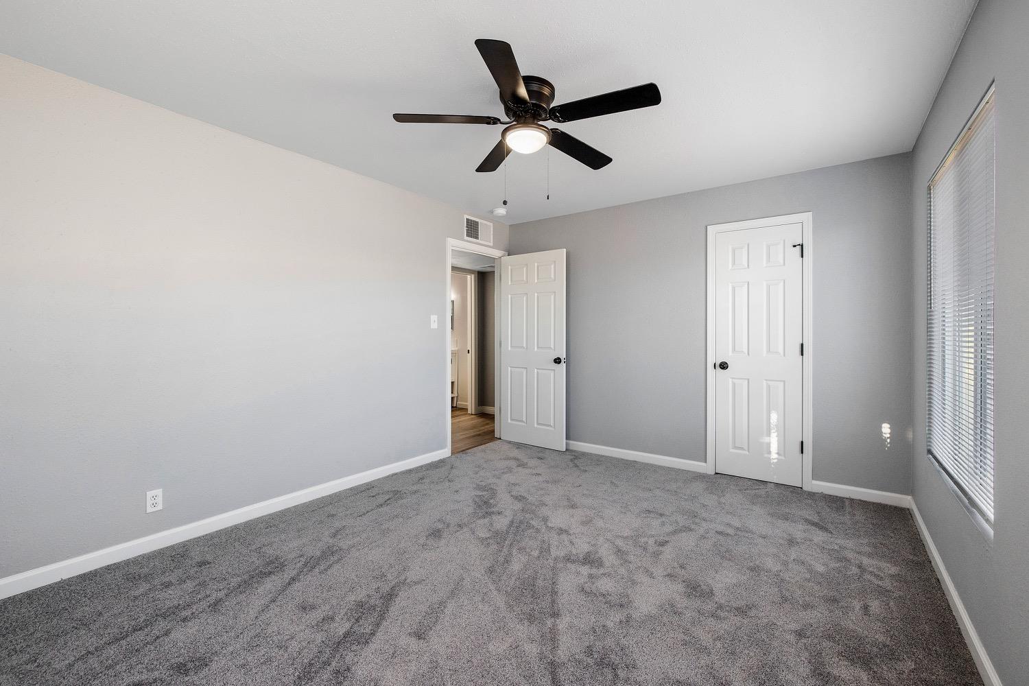 71 East Griffith Way Fresno, CA 93704 - Photo 22 of 35 wooden floor in an empty room