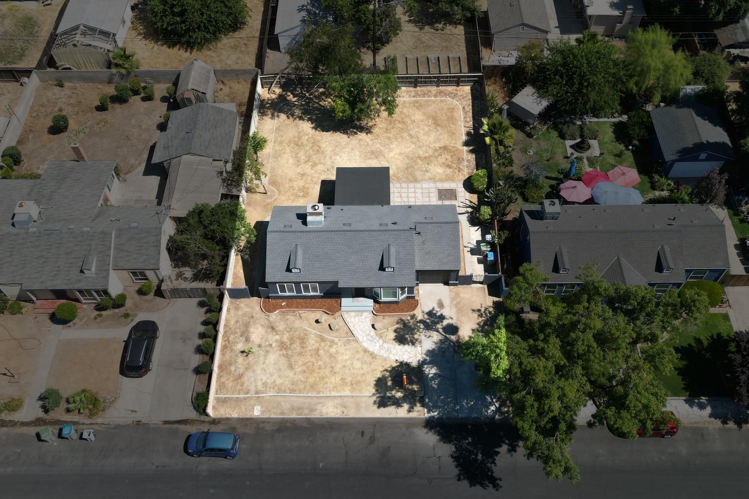 71 East Griffith Way Fresno, CA 93704 - Photo 34 of 35 an aerial view of a house with yard