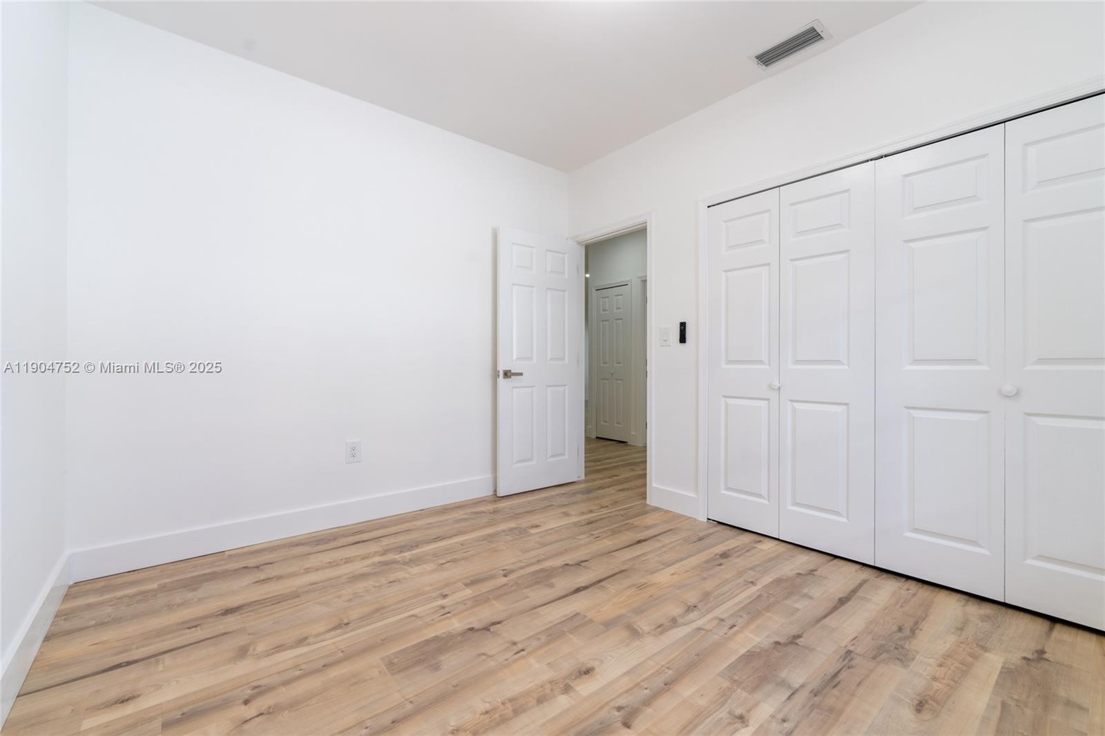 14231 Southwest 147th Place Miami, FL 33196 - Photo 25 of 35 a view of an empty room