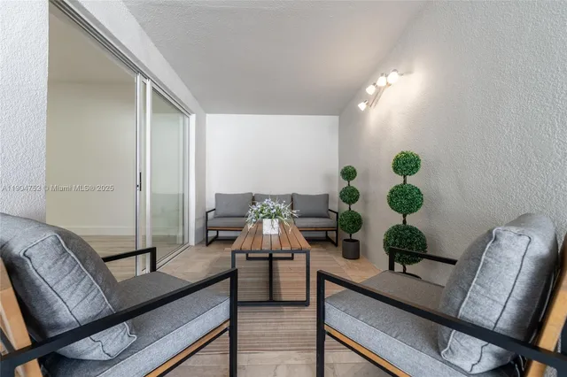 a view of a hardwood floor and workspace in a room