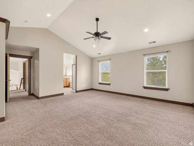 1279 West 1500th Street North Mapleton, UT 84664 - Photo 40 of 83 Spacious room featuring vaulted ceilings, recessed lighting, and a ceiling fan