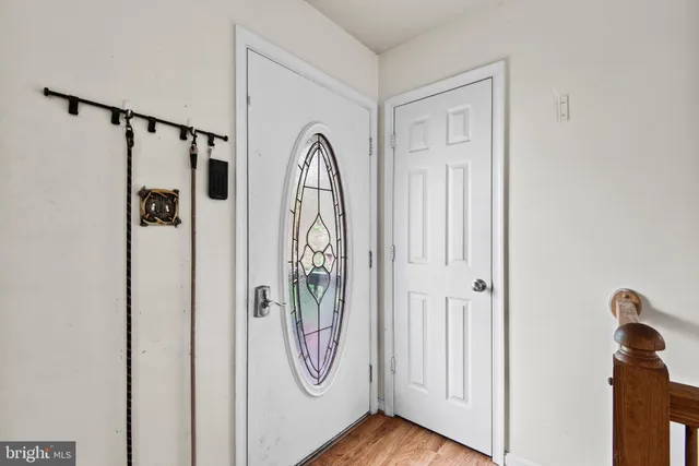 a view of a entryway with wooden floor