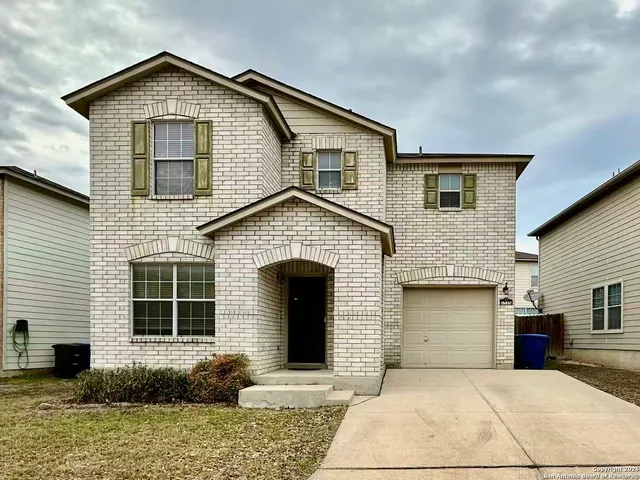 a picture of a bench in the window
