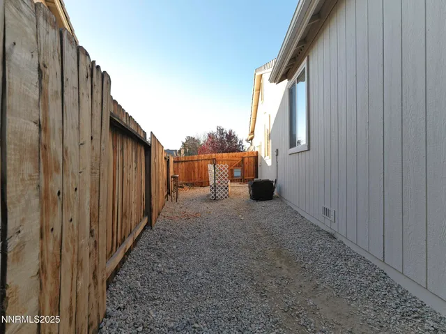 a view of a back yard of the house