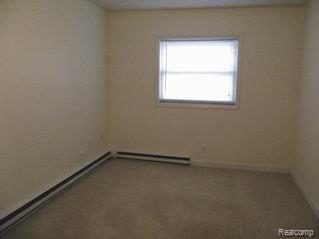 3111 Curtis Road Leonard, MI 48367 - Photo 15 of 17 Curtis Bedroom.jpg