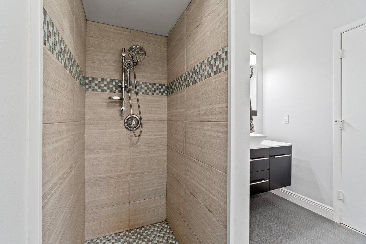 19977 Villa Medici Place Boca Raton, FL 33434 - Photo 20 of 33 a bathroom with a shower
