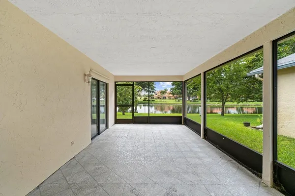 a view of a garden with an outdoor seating