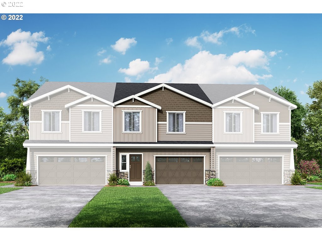 2354 South Trail View Ridgefield, WA 98642 - Photo 1 of 26 a front view of a house with a garden and yard