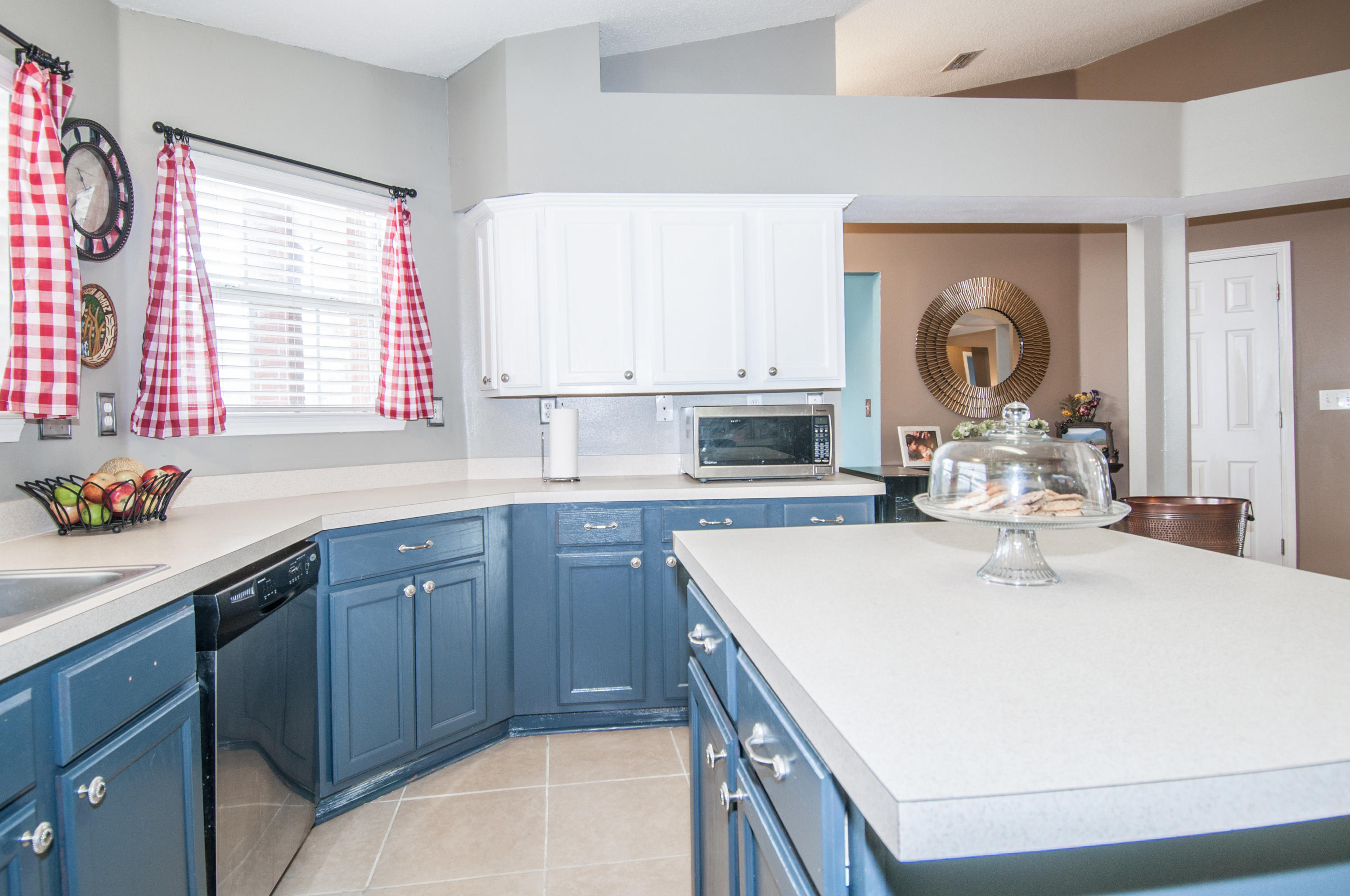 210 Limestone Circle Crestview, FL 32539 - Photo 16 of 54 a kitchen with a sink a stove and cabinets