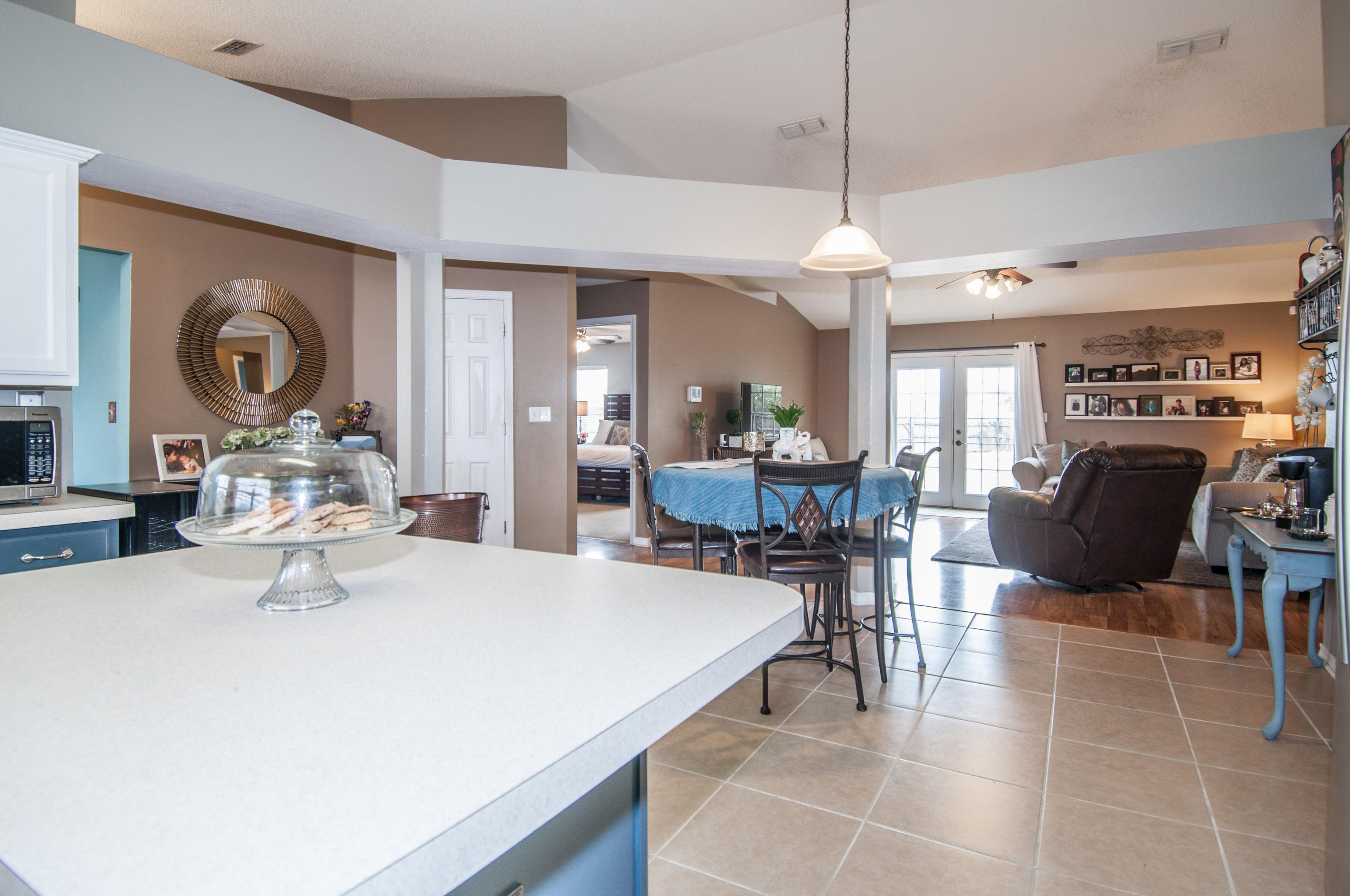 210 Limestone Circle Crestview, FL 32539 - Photo 17 of 54 a large kitchen with a table and chairs