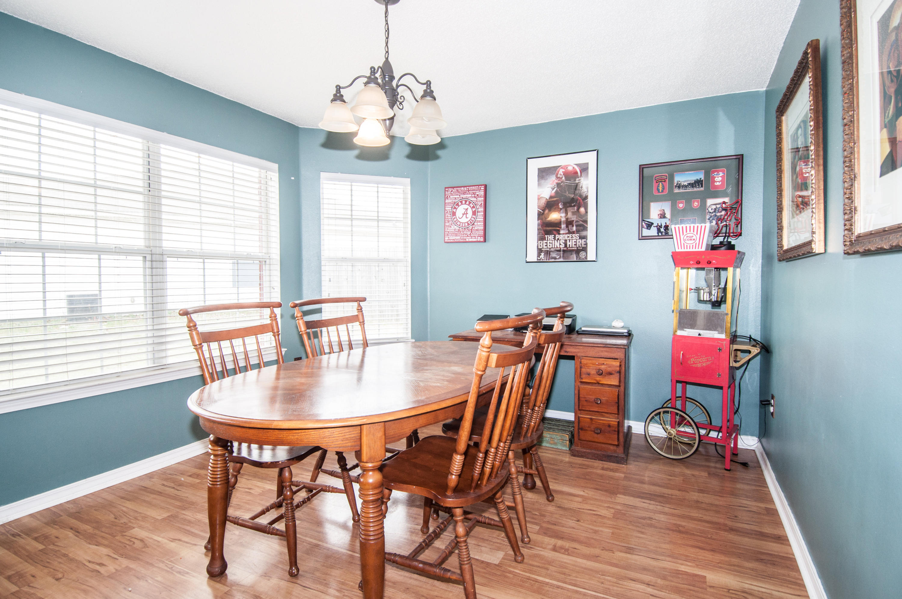 210 Limestone Circle Crestview, FL 32539 - Photo 23 of 54 a view of a dining room with furniture window and wooden floor