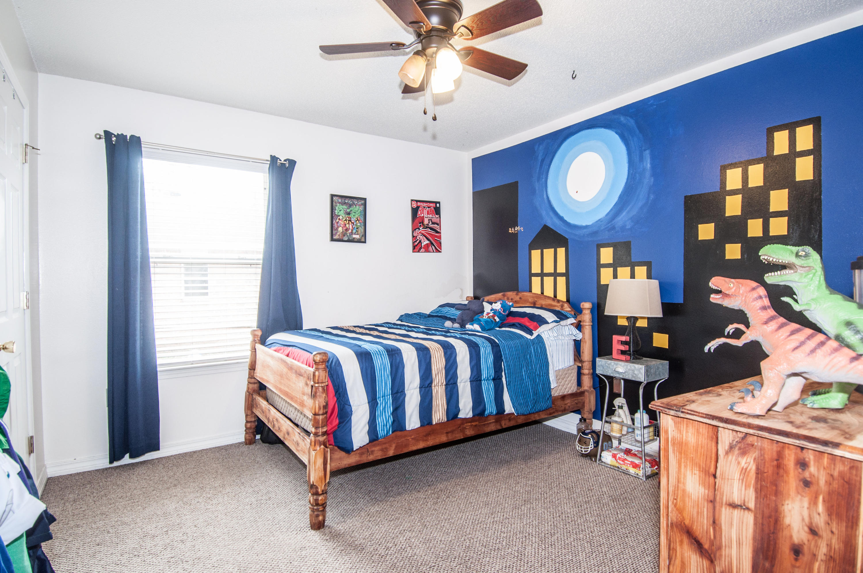 210 Limestone Circle Crestview, FL 32539 - Photo 27 of 54 a bed sitting in a room next to a window