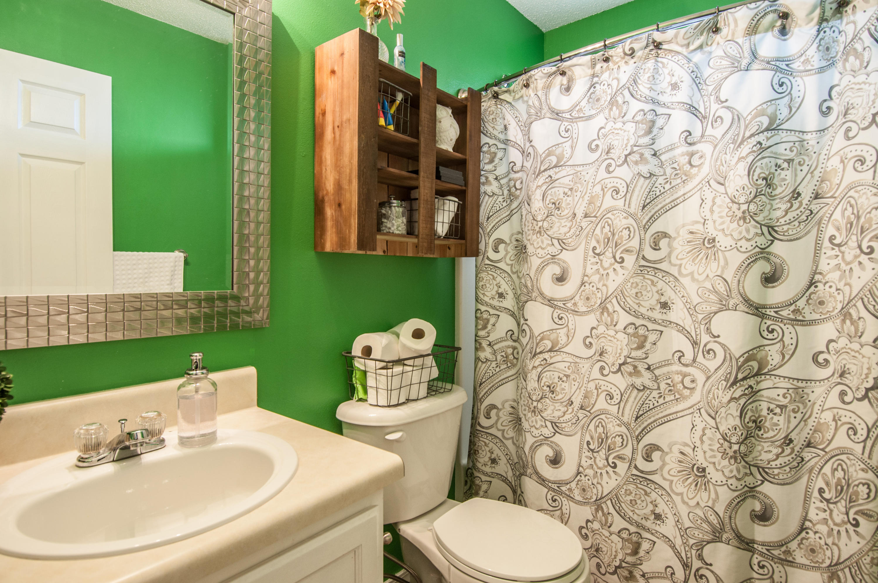 210 Limestone Circle Crestview, FL 32539 - Photo 36 of 54 a bathroom with a sink and a mirror