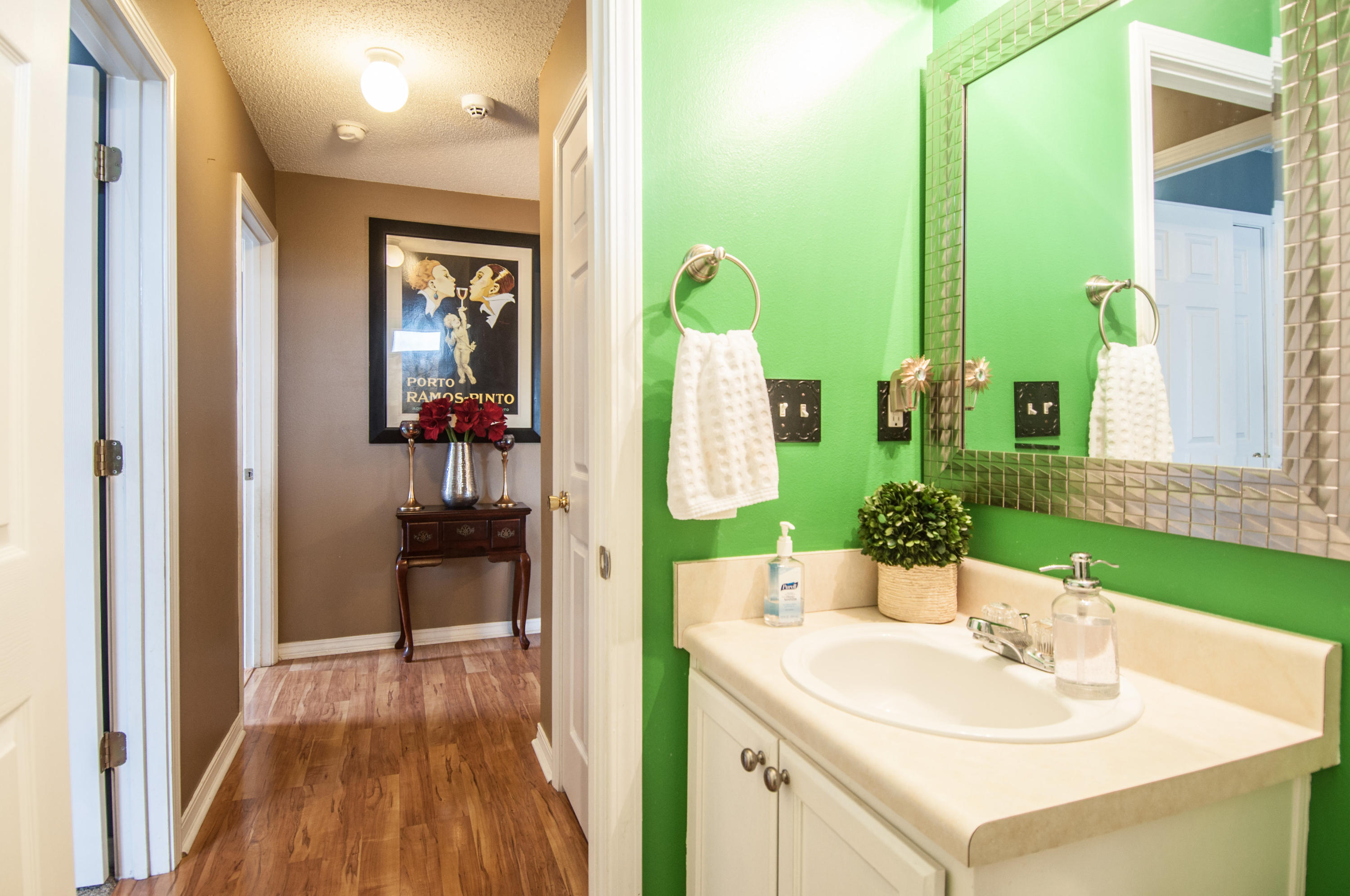 210 Limestone Circle Crestview, FL 32539 - Photo 37 of 54 a en suite bathroom with a sink and a mirror