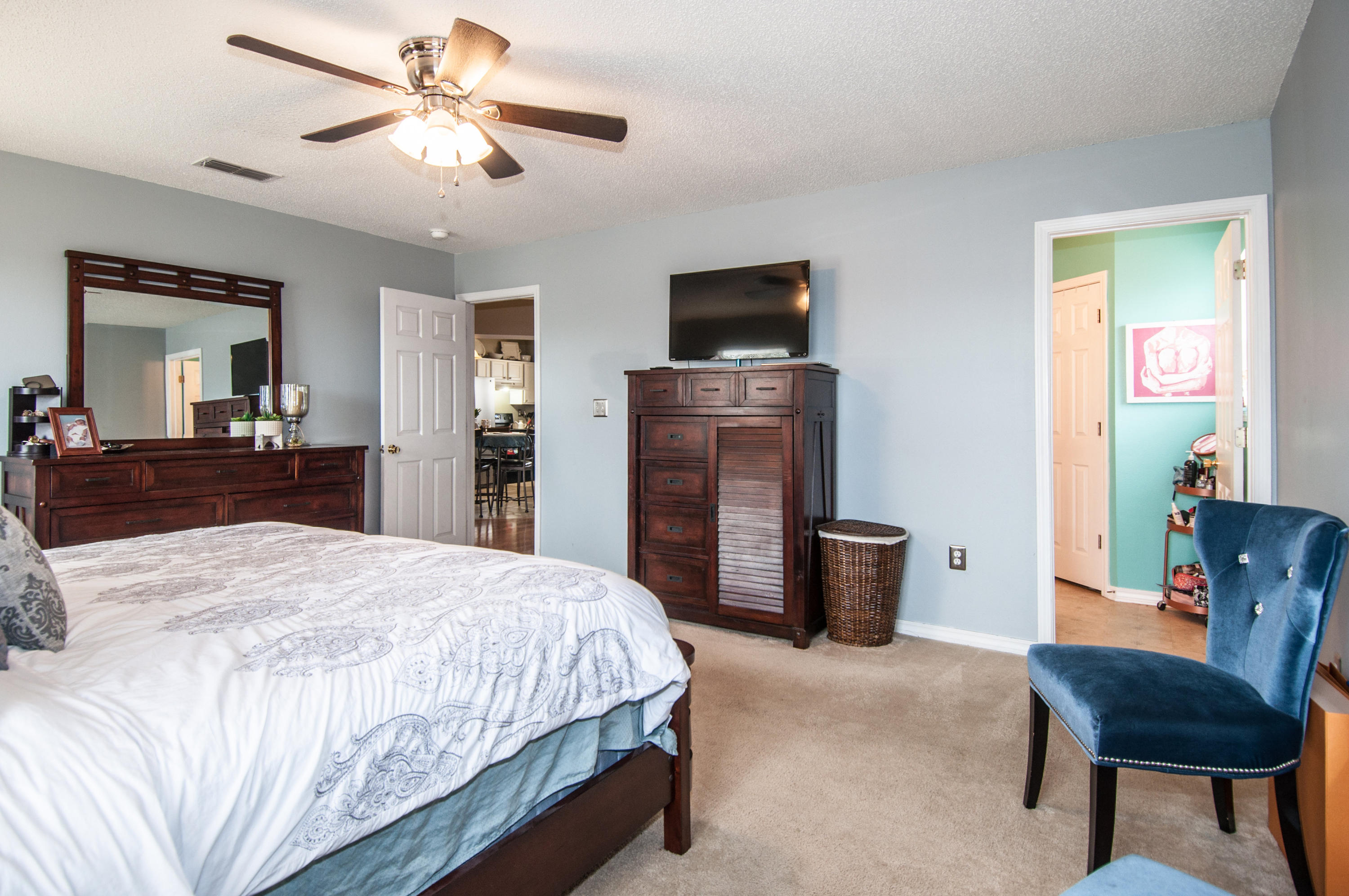 210 Limestone Circle Crestview, FL 32539 - Photo 45 of 54 a bedroom with a bed and a flat screen tv