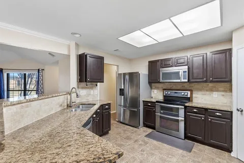 $350,000 | 828 Arbor Downs Drive, Plano, TX 75023