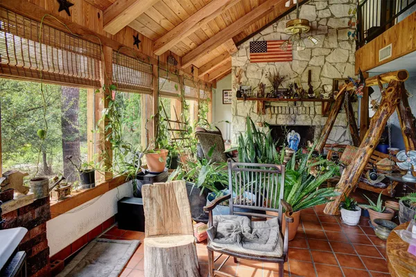 a view of balcony with furniture