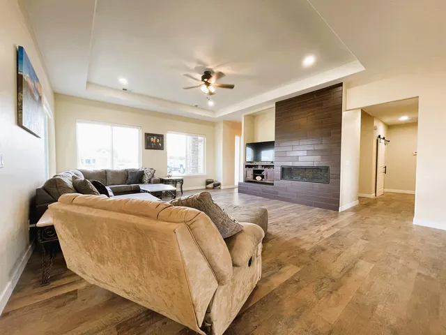a dining room with furniture and window