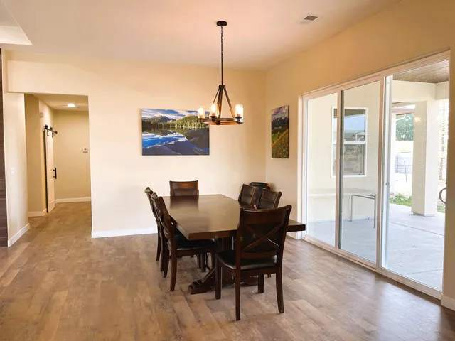 a kitchen with a sink stainless steel appliances and cabinets