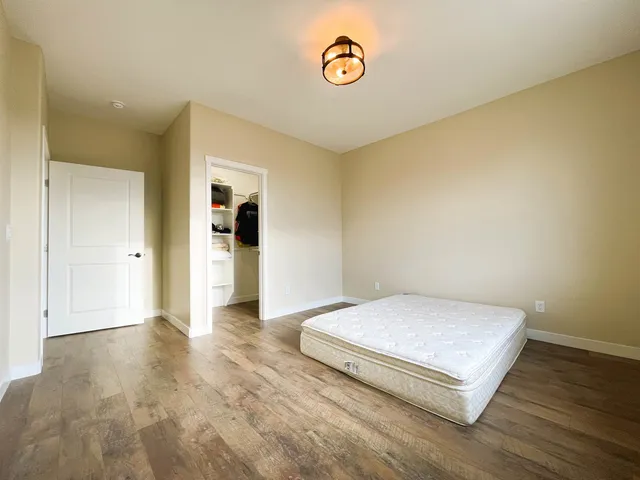 a bathroom with a sink vanity and mirror