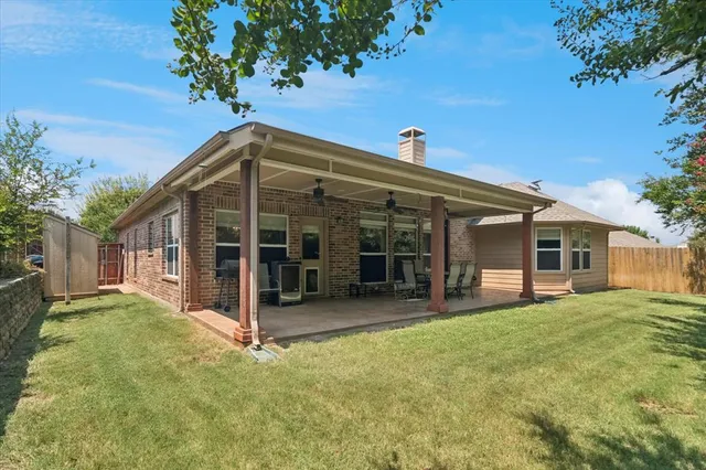 a view of backyard with green space
