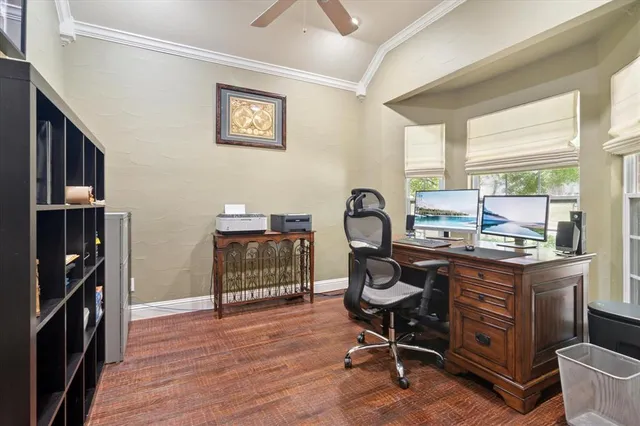 a living room with a piano and a table
