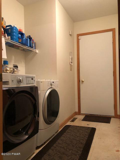 116 Maple Ridge Drive Hawley, PA 18428 - Photo 14 of 19 a utility room with dryer and washer