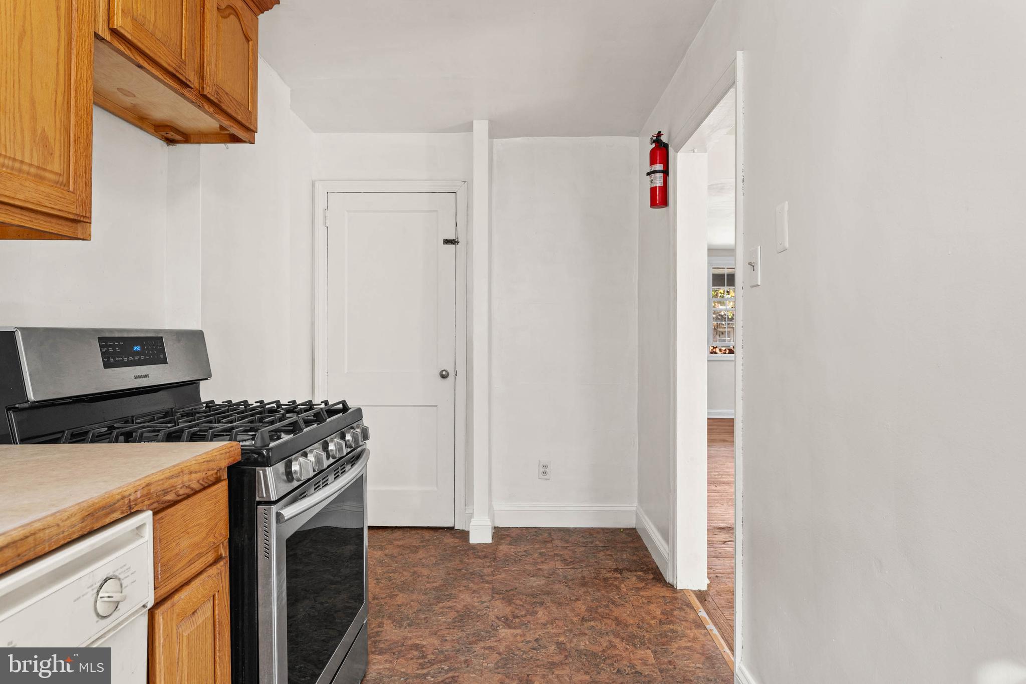 703 Humphreys Road Ardmore, PA 19003 - Photo 11 of 26 a kitchen with a stove and a refrigerator