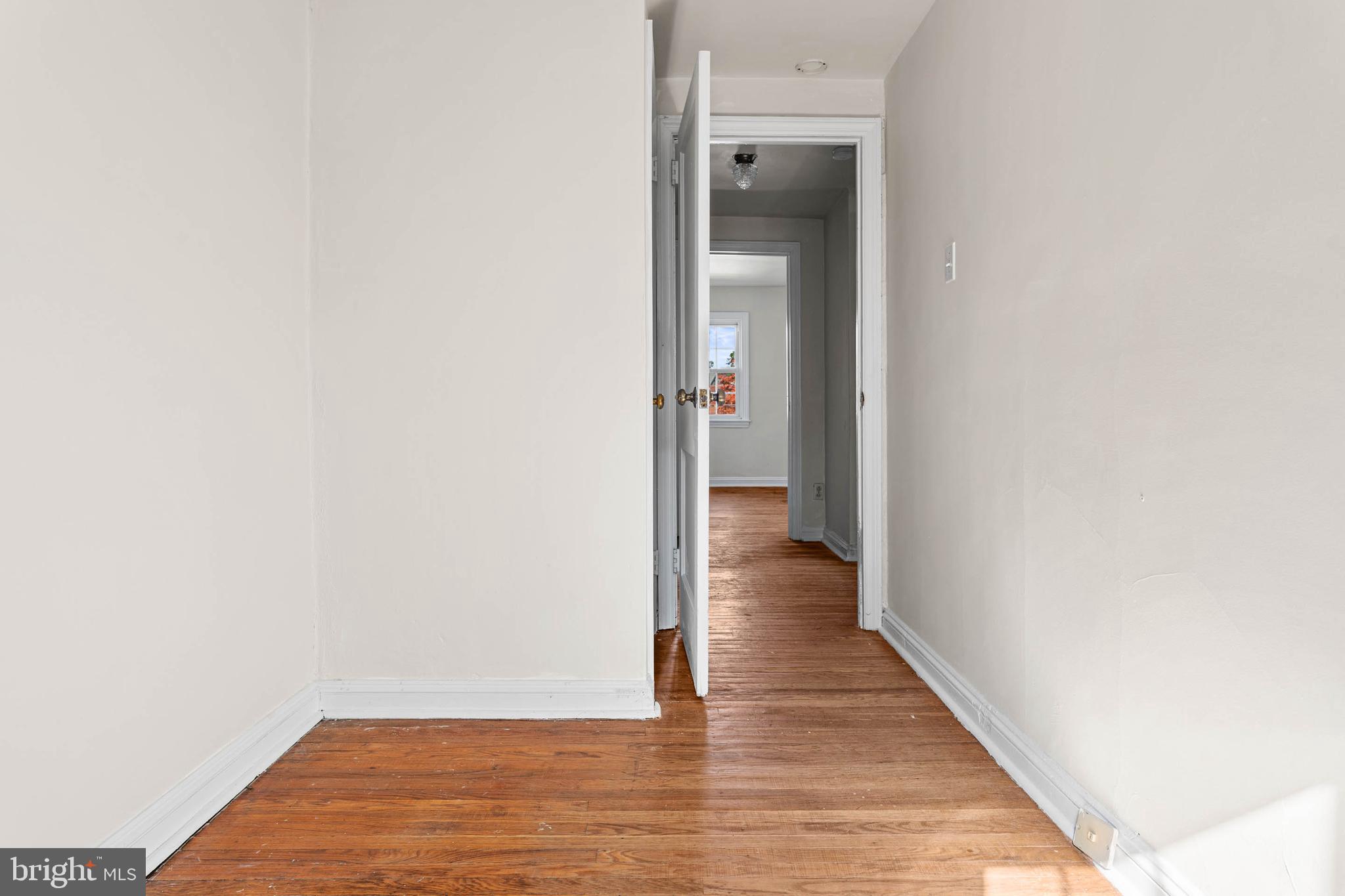 703 Humphreys Road Ardmore, PA 19003 - Photo 18 of 26 a view of a hallway with wooden floor