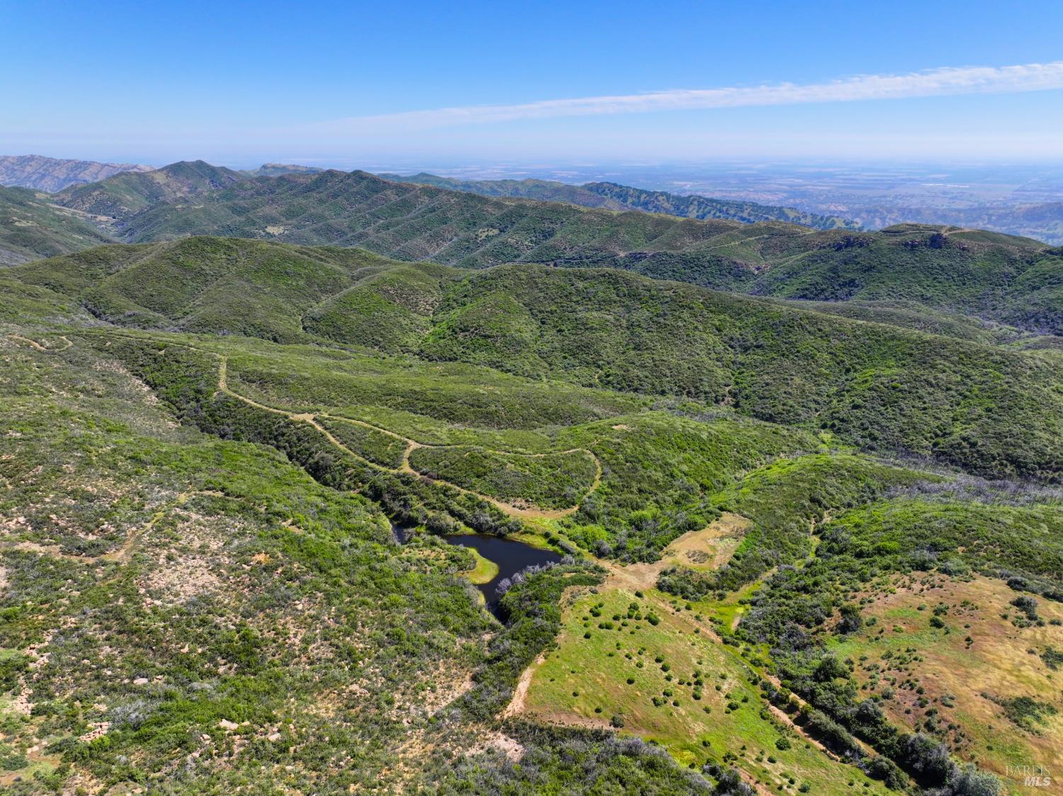 0 Blue Ridge Road Vacaville, CA 95688 - Photo 12 of 13 a view of a lush green hillside and a mountain