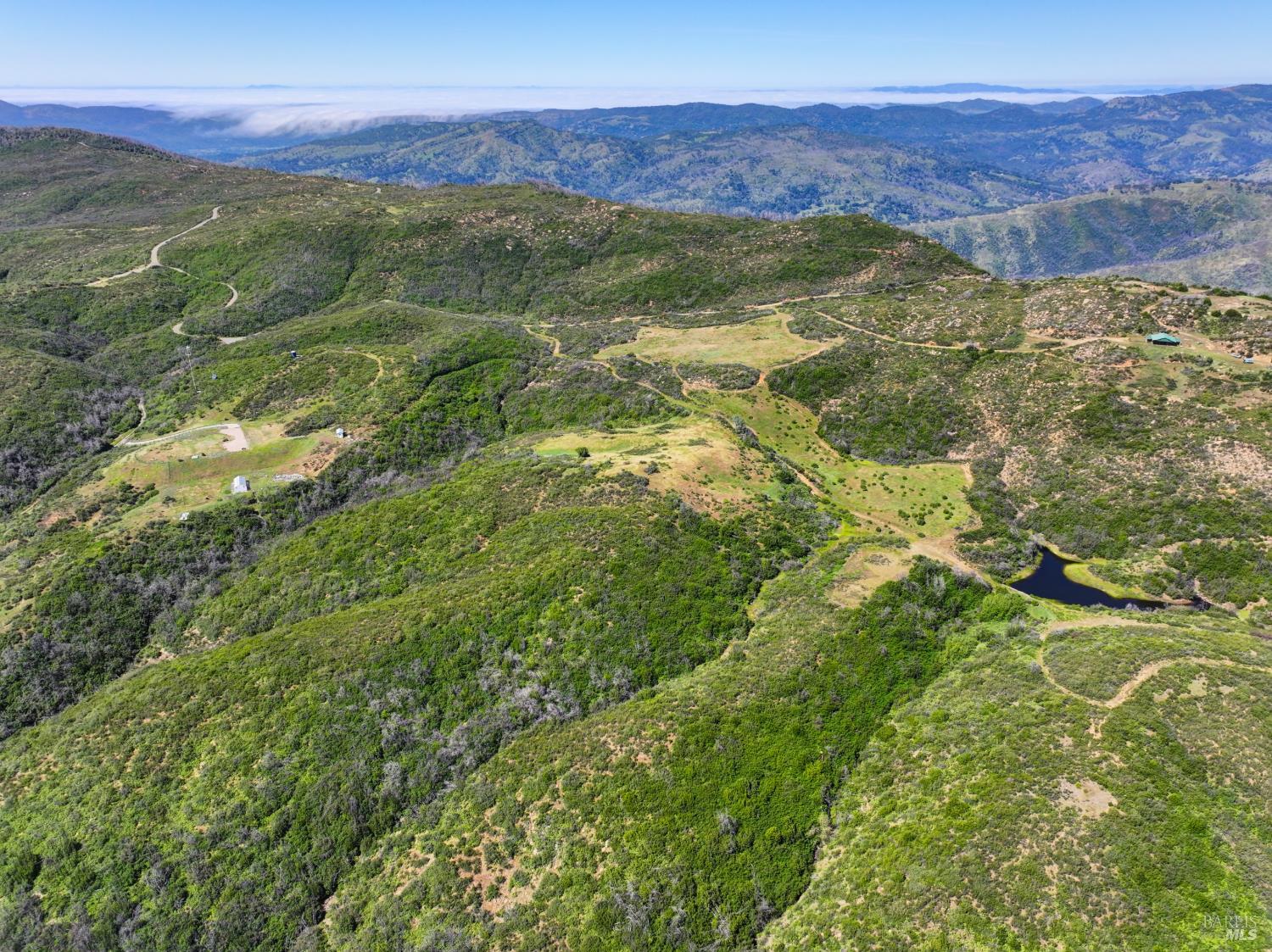 0 Blue Ridge Road Vacaville, CA 95688 - Photo 4 of 13 a view of a lush green hillside and an ocean