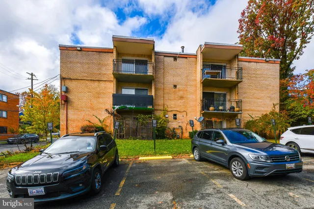 a car parked in front of a house
