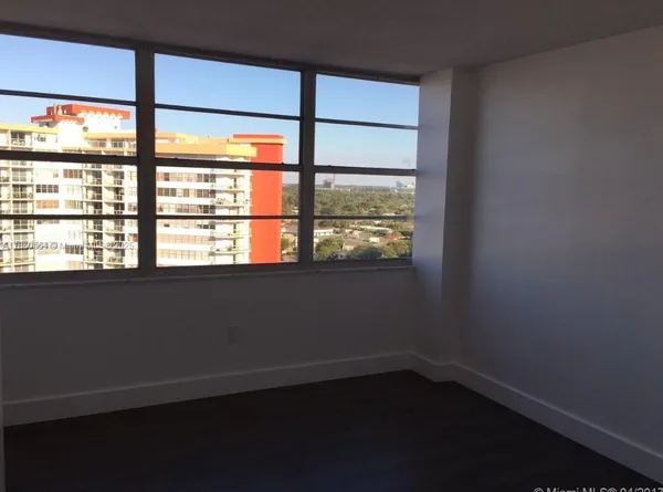 an empty room with a window