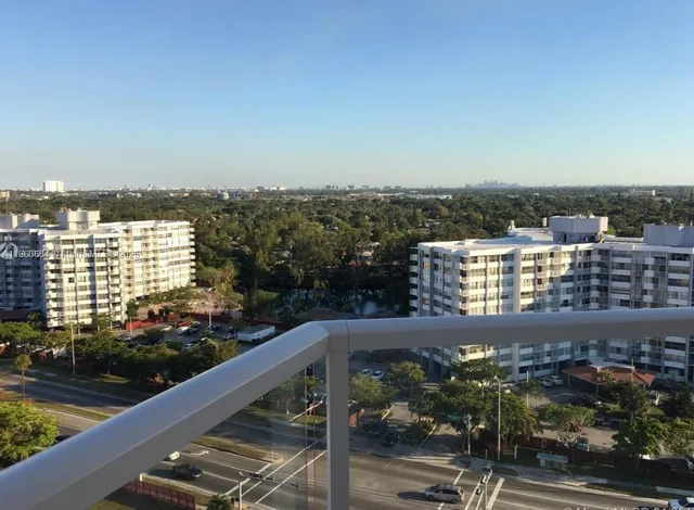 a view of a balcony with city