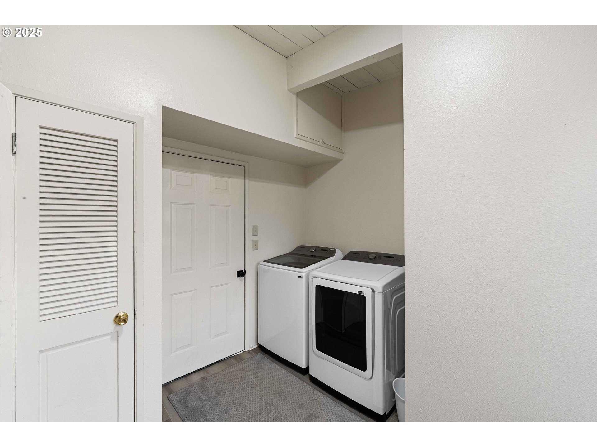 875 Ocean Drive Southwest Bandon, OR 97411 - Photo 14 of 31 a view of utility room with washer and dryer