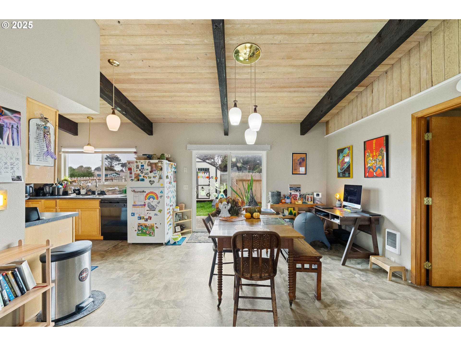 875 Ocean Drive Southwest Bandon, OR 97411 - Photo 18 of 31 a view of a dining room with furniture