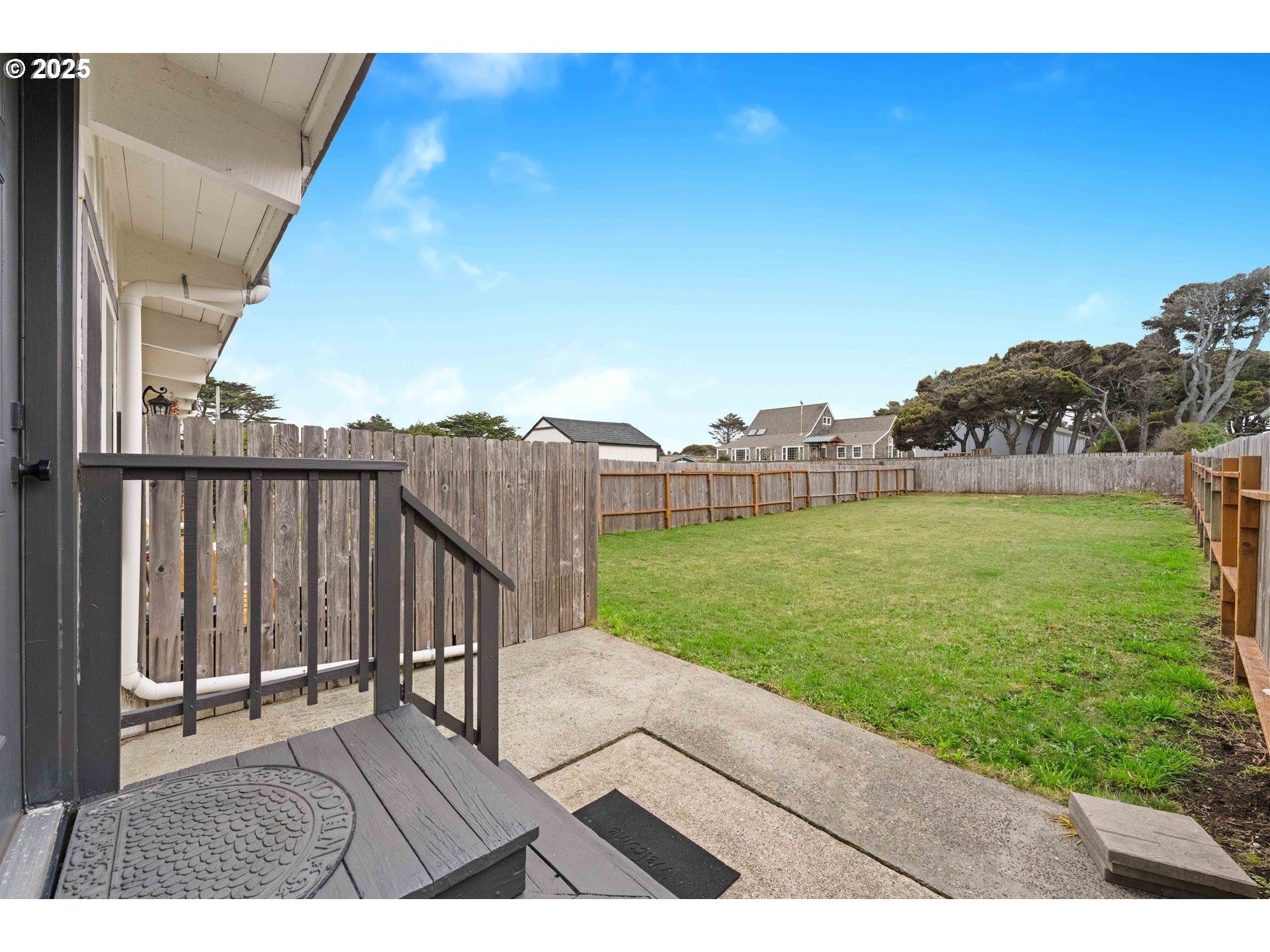 875 Ocean Drive Southwest Bandon, OR 97411 - Photo 26 of 31 a view of a back yard