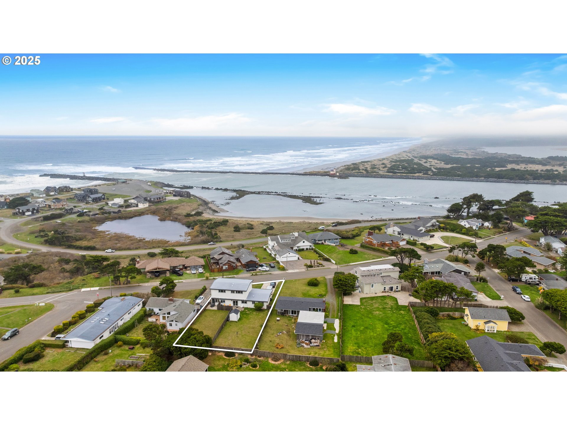 875 Ocean Drive Southwest Bandon, OR 97411 - Photo 3 of 31 an aerial view of multiple house