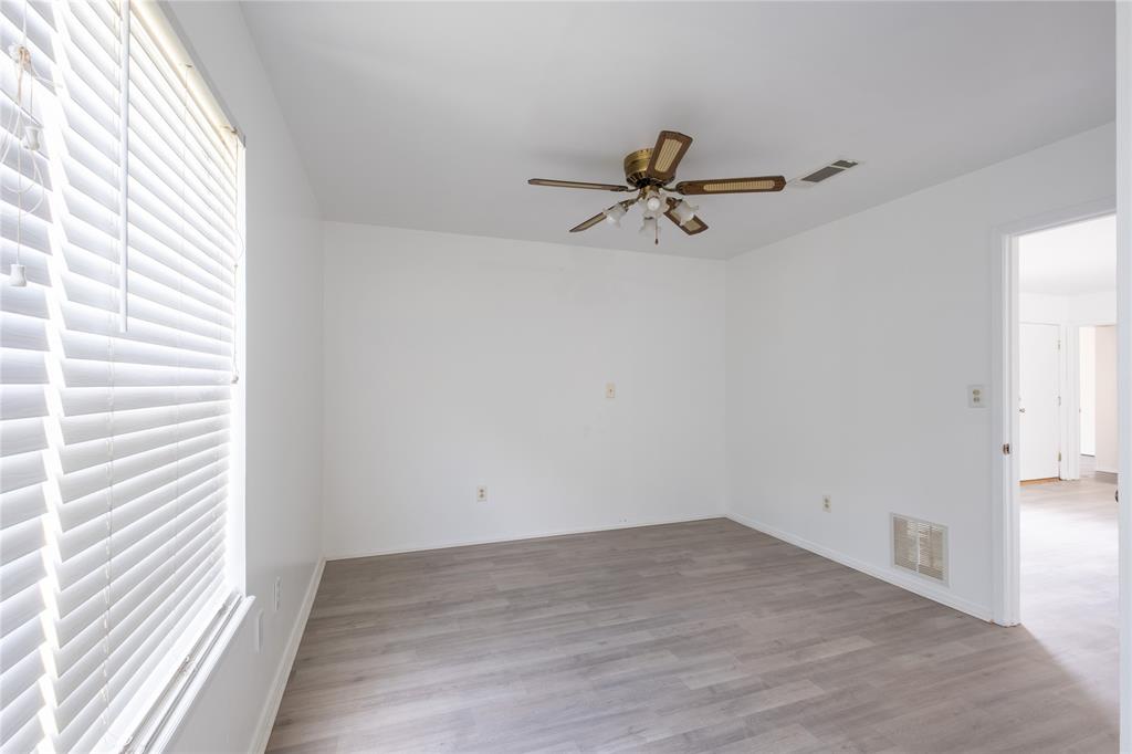 3126 Colgate Avenue Tyler, TX 75701 - Photo 24 of 33 a view of a room with a window and a ceiling fan