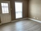 6702 Everhart Road, Unit D106 Corpus Christi, TX 78413 - Photo 3 of 4 an empty room with a window