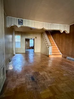 a view of a hallway with an empty room