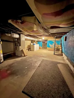 a view of parking garage with cars
