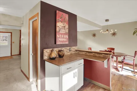 a kitchen with a stove and a sink